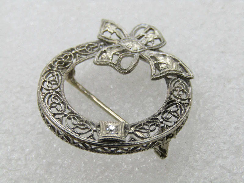 Early 1900's 14kt Filigree Diamond Brooch, Circle with Bow, 1"