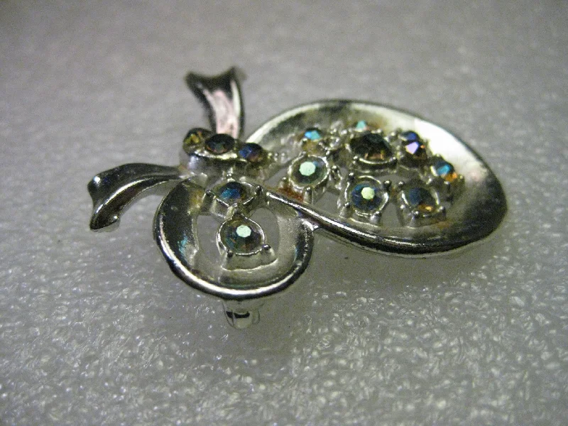 Vintage 1950's Silvertone Bow Brooch with Aurora Borealis Blue Rhinestones -